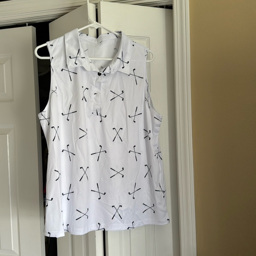 White sleeveless golf shirt with black golf clubs, design side large